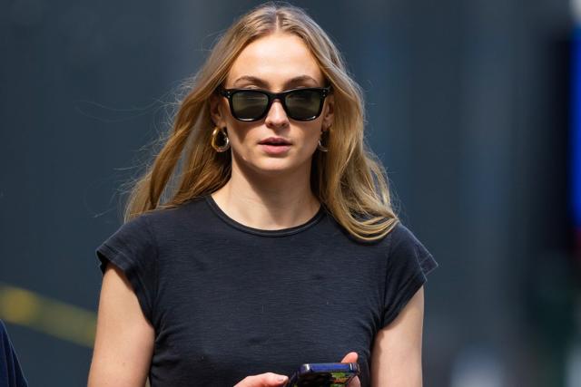 Sophie Turner Arrives at N.Y.C. Dinner with Friend amid Custody Battle