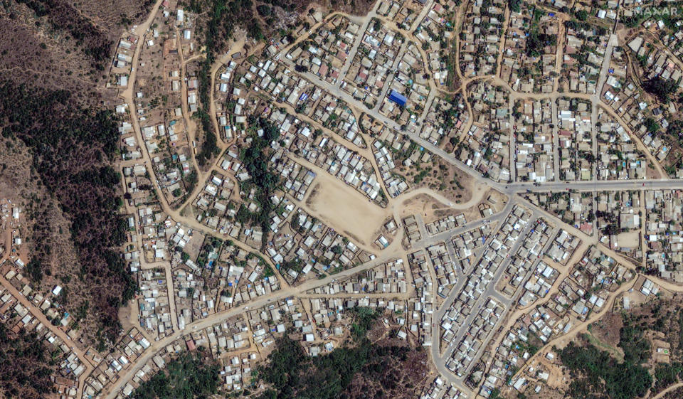 A view of homes and buildings in the town of Quilpué before the wildfires.  / Credit: Satellite image ©2024 Maxar Technologies