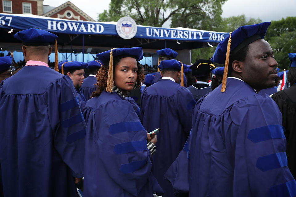 WASHINGTON, DC - MAY 07: Brittani Saafir-Callaway of Cleveland, Ohio, waits with other members of the class of 2016 for the beginning of the 2016 commencement ceremony at Howard University May 7, 2016 in Washington, DC. President Obama is the sixth sitting U.S. president to deliver the commencement speech at Howard University. (Photo by Alex Wong/Getty Images)