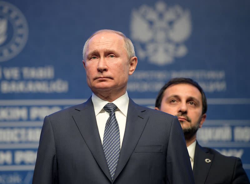 FILE PHOTO: Russian President Vladimir Putin attends a ceremony marking the formal launch of the TurkStream pipeline which will carry Russian natural gas to southern Europe through Turkey, in Istanbul