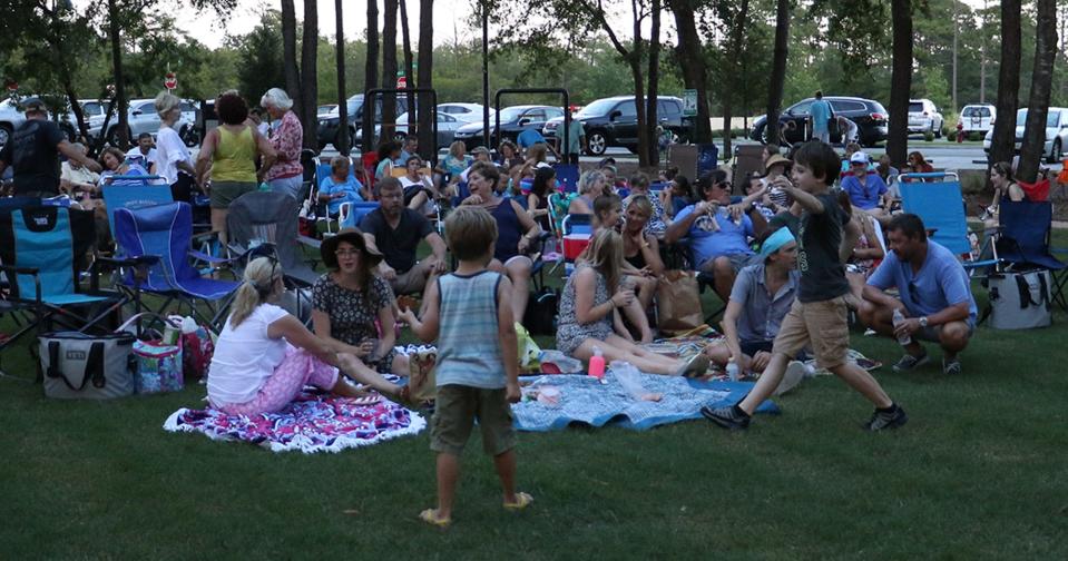 Members of the audience danced and mingled as they listened to music by Onward, Soliders at RiverLights in Wilmington, NC, as part of the Live Oak Commons Summer Concert Series on Saturday, July 15, 2017. Outdoor concerts are popular during the summer.