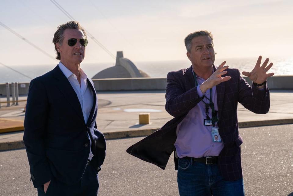 California Gov. Gavin Newsom, left, listens to Tom Jones, PG&E’s senior director of regulatory, environmental and repurposing, during a tour of Diablo Canyon nuclear power plant in Avila Beach on March 1, 2023. Governor's Office