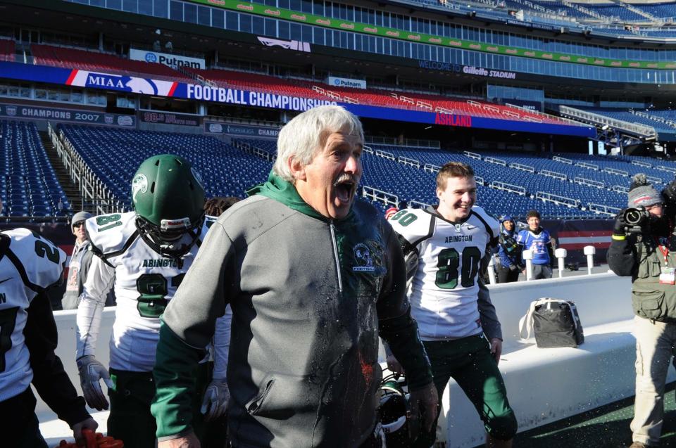 Abington head coach Jim Kelliher wears a bucket of ice water from Will Klein, to celebrate at the conclusion of their division 7 Super Bowl game at Gillette Stadium on Saturday, Dec. 7, 2019. 
(Marc Vasconcellos/The Enterprise)