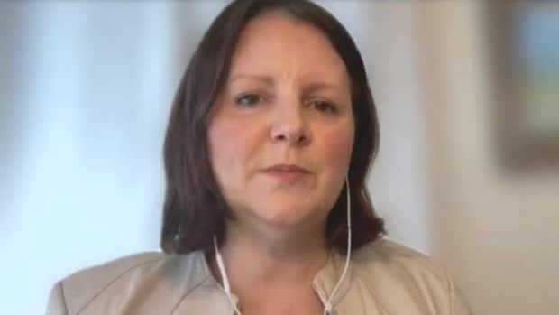 Dr. Jennifer Russell, New Brunswick's chief medical officer of health, participated in Friday's COVID update remotely because she is self-isolating for 72 hours as a result of her contact with an affected school. (CBC - image credit)