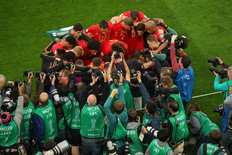 <p>Photographers try to get a shot of the Belgium national sides huddle before the 2018 FIFA World Cup Russia Semi Final match between Belgium and France at Saint Petersburg Stadium on July 10, 2018 in Saint Petersburg, Russia. (Photo by Robbie Jay Barratt – AMA/Getty Images) </p>