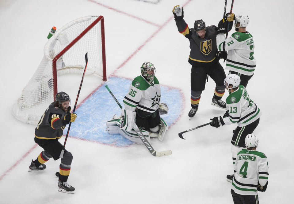 Vegas Golden Knights' Mark Stone (61) and Paul Stastny (26) celebrate a goal against Dallas Stars goalie Anton Khudobin (35) during the second period of Game 2 of the NHL hockey Western Conference final, Tuesday, Sept. 8, 2020, in Edmonton, Alberta. (Jason Franson/The Canadian Press via AP)