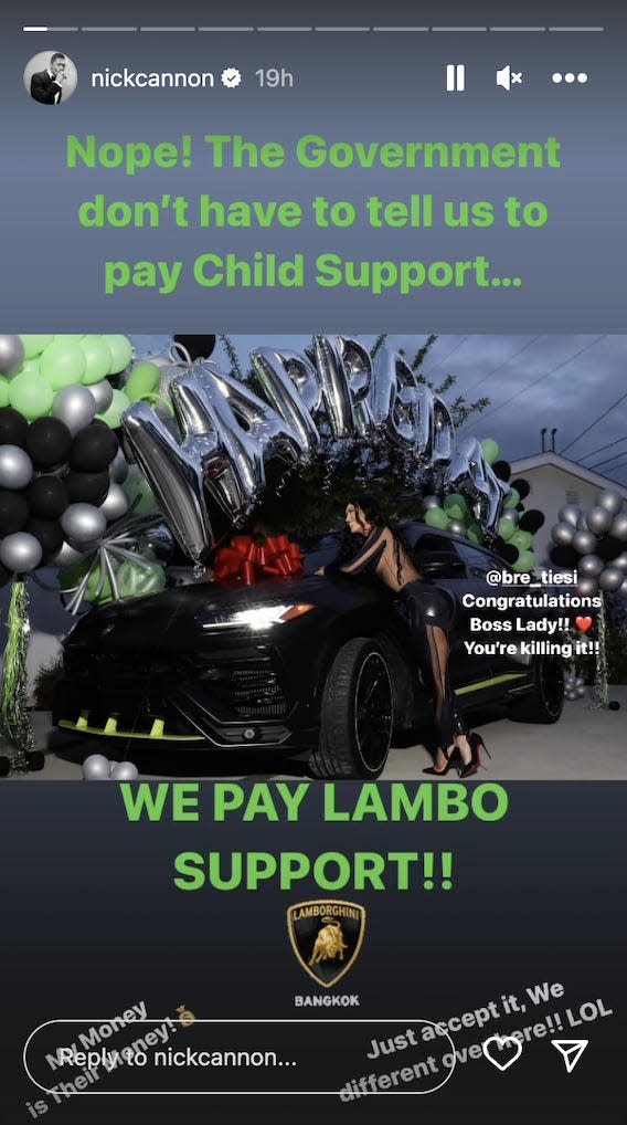 A screenshot of Nick Cannon's Instagram story where Bre Tiesi is shown leaning over a black Lamborghini that is covered in birthday balloons.