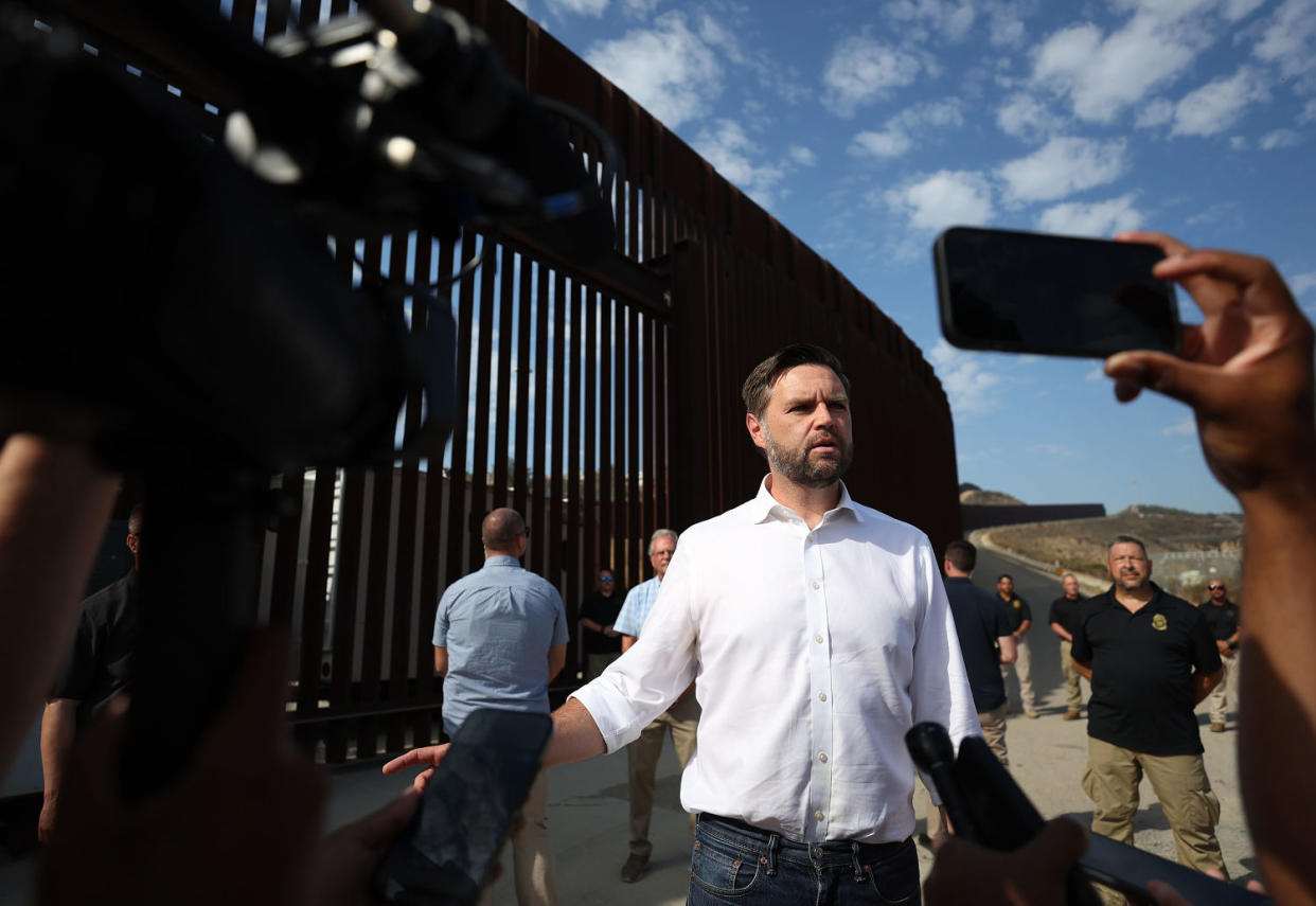 Republican vice presidential nominee Sen. J .D. Vance speaks to reporters in front of the border wall with Mexico on Sept. 06, 2024 in San Diego, California.  (Justin Sullivan / Getty Images)