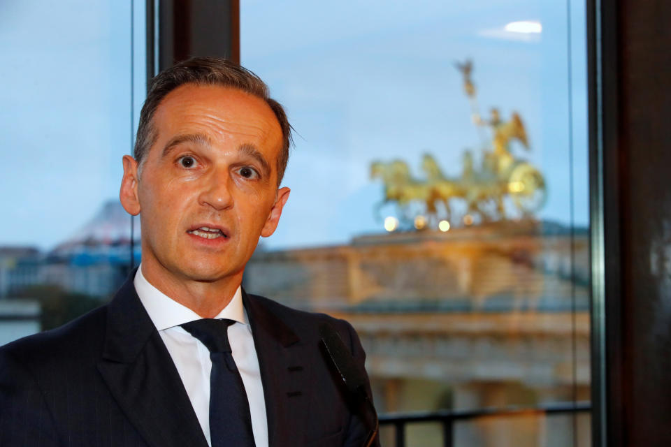 German Foreign Minister Heiko Maas speaks at a ceremony marking the 30th anniversary of the fall of the Berlin Wall with the Quadriga of the Brandenburg Gate in the background, in Berlin, Germany November 9, 2019. REUTERS/Hannibal Hanschke/Pool