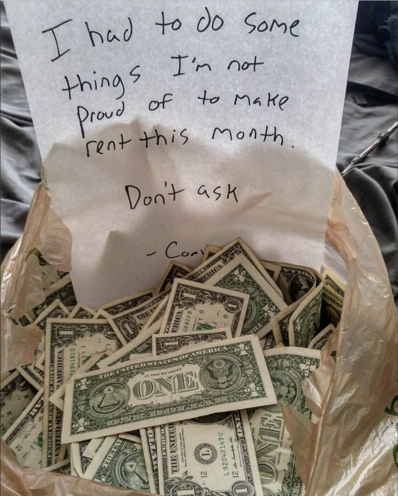 A pile of $1 bills with a note
