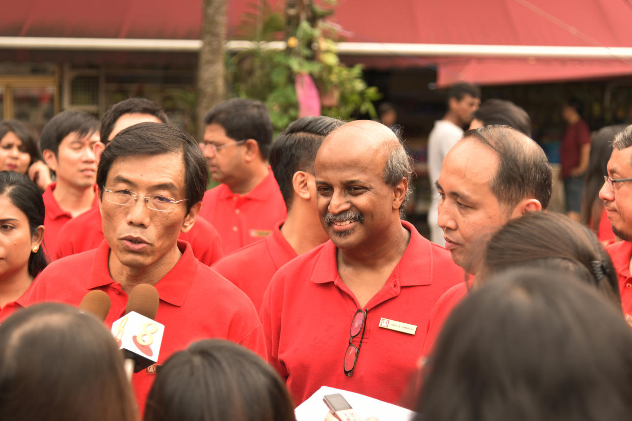 SDP secretary-general Chee Soon Juan (left) and SDP chairman Paul Tambyah (centre) at a media doorstop on 4 August, 2019. (PHOTO: SDP)