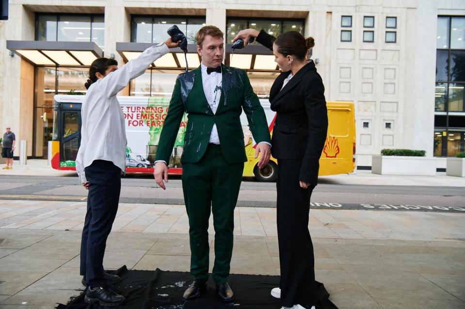 Lycett also performed a dance with several dancers and was covered in grey paint, which was supposed to represent oil. (Rob Parfitt/Channel 4/PA) (PA)