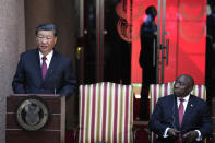 Chinese President Xi Jinping, left, speaks during a joint media briefing with South Africa's President Cyril Ramaphosa at Union Building in Pretoria, South Africa, Tuesday, Aug. 22, 2023. Jinping has arrived for a state visit in South Africa where the two countries are expected to strengthen ties ahead of the BRICS summit starting in Johannesburg on Tuesday. (AP Photo/Themba Hadebe)