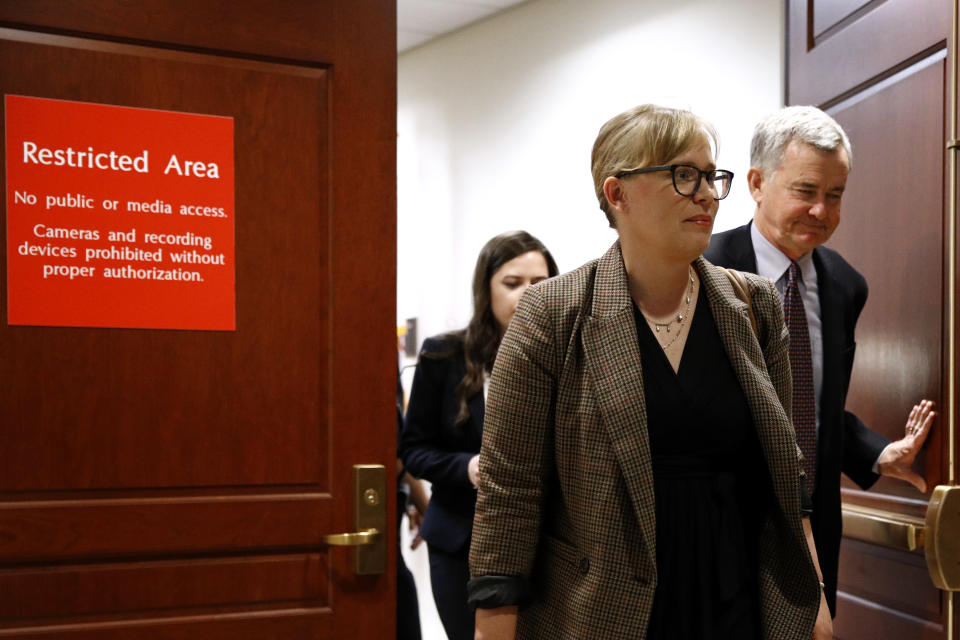 Catherine Croft, a State Department adviser on Ukraine, departs a secure area of the Capitol after a closed door meeting where she testified as part of the House impeachment inquiry into President Donald Trump, Wednesday, Oct. 30, 2019, on Capitol Hill in Washington. (AP Photo/Patrick Semansky)