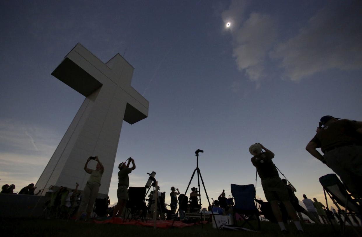 A total solar eclipse is seen above the Bald Knob Cross of Peace on Aug. 21, 2017, in Alto Pass, Illinois. <a href="https://newsroom.ap.org/detail/EclipseIllinois/fabefecb5a214a788d11c056a5542d6d/photo?Query=solar%20eclipse%20jesus&mediaType=photo&sortBy=&dateRange=Anytime&totalCount=623&digitizationType=Digitized&currentItemNo=NaN&vs=true&vs=true" rel="nofollow noopener" target="_blank" data-ylk="slk:AP Photo/Charles Rex Arbogast;elm:context_link;itc:0;sec:content-canvas" class="link ">AP Photo/Charles Rex Arbogast</a>