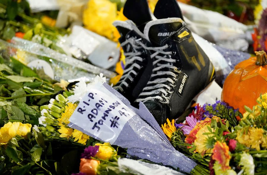 Floral tributes outside the Motorpoint Arena ahead of a memorial for Nottingham Panthers’ ice hockey player Adam Johnson, in Nottingham, England, Saturday, Nov. 4, 2023. Johnson, a 29-year-old from Minnesota, died at a hospital after being cut in the neck by the skate blade of an opponent during a game last Saturday night in the Elite Ice Hockey League. The league called it a “freak accident,” and South Yorkshire Police have said they are investigating. (Zac Goodwin/PA via AP)