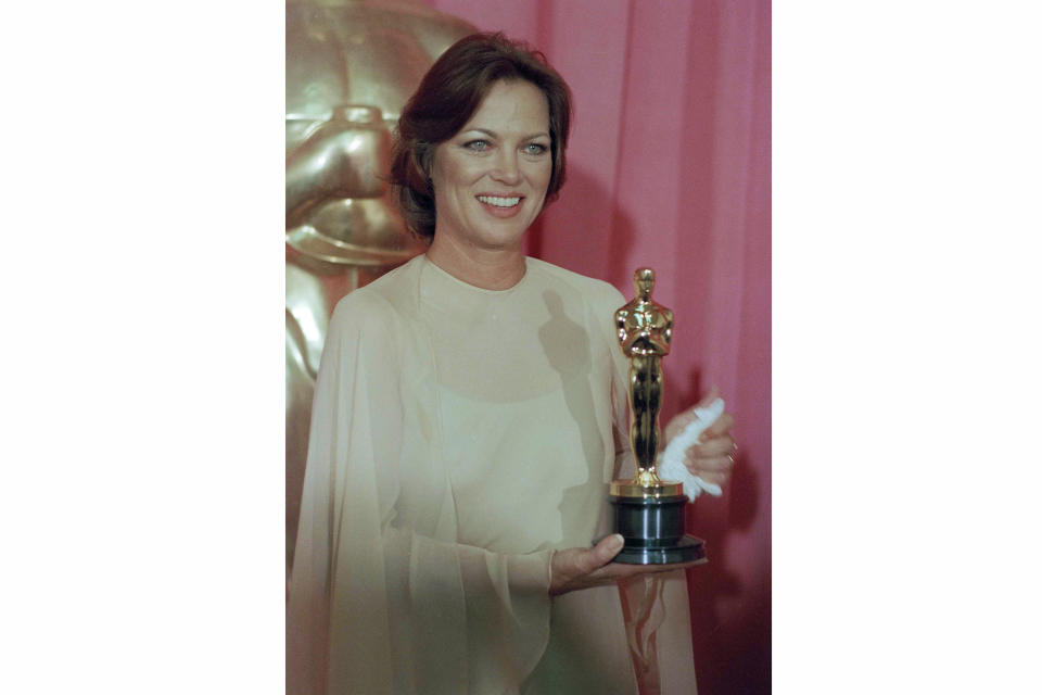 FILE - Louise Fletcher holds the Academy Award she won for her leading role in 