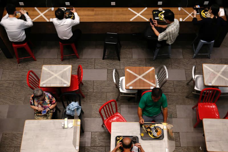 Social distancing marks are seen at a restaurant following the coronavirus disease (COVID-19) outbreak in Hong Kong