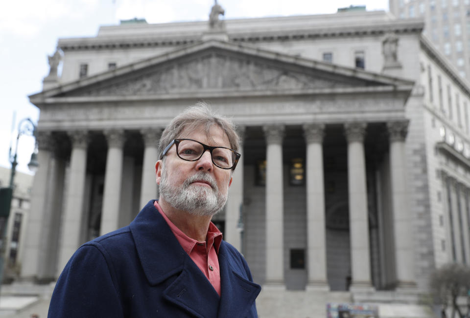 Brian Toale, 65, a sexual abuse victim when he was a student in a Long Island Catholic school, and now an activist, poses for a photograph in front of Thurgood Marshall Courthouse in New York's Foley Square on Wednesday, Jan. 9, 2019. Toale is in favor of revising existing statute of limitations laws to give victims of long-ago sex abuse a window to get their day in court. As a new legislative season begins, prospects for reforming such laws are high, especially in New York State. (AP Photo/Kathy Willens)