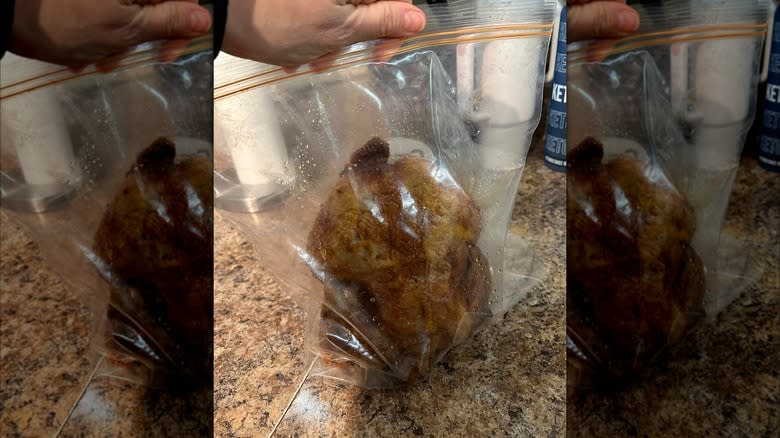 Rotisserie chicken in plastic bag