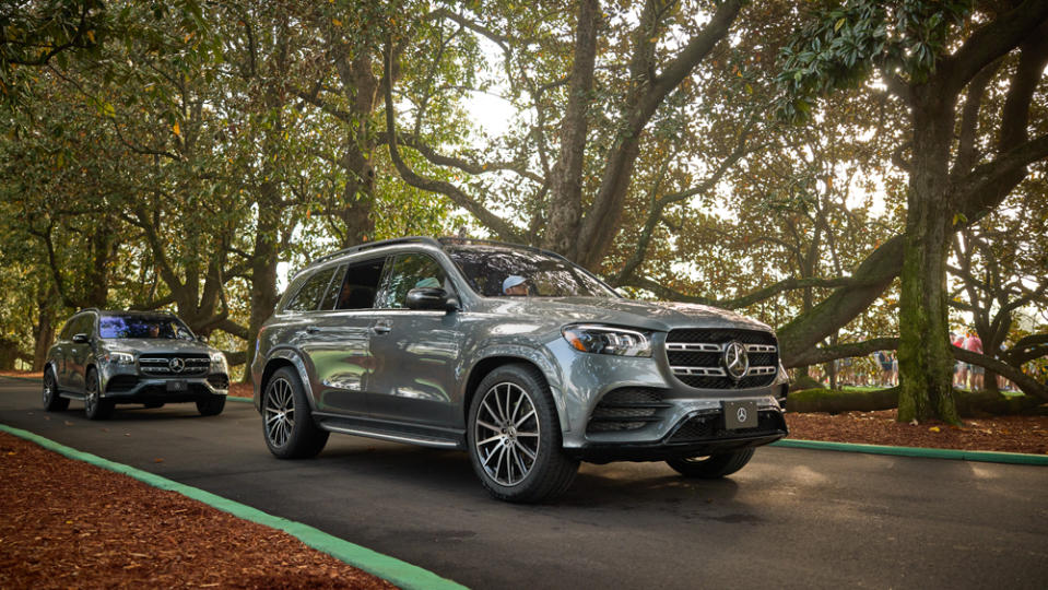 Mercedes-Benz SUVs driving through Augusta National during the 2023 Masters Tournament.