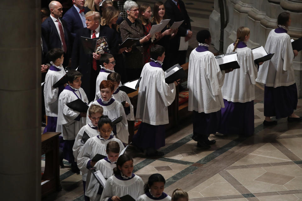 President Donald Trump and first lady Melania Trump attend a Christmas Eve service at the National Cathedral, Monday, Dec. 24, 2018, in Washington. (AP Photo/Jacquelyn Martin)