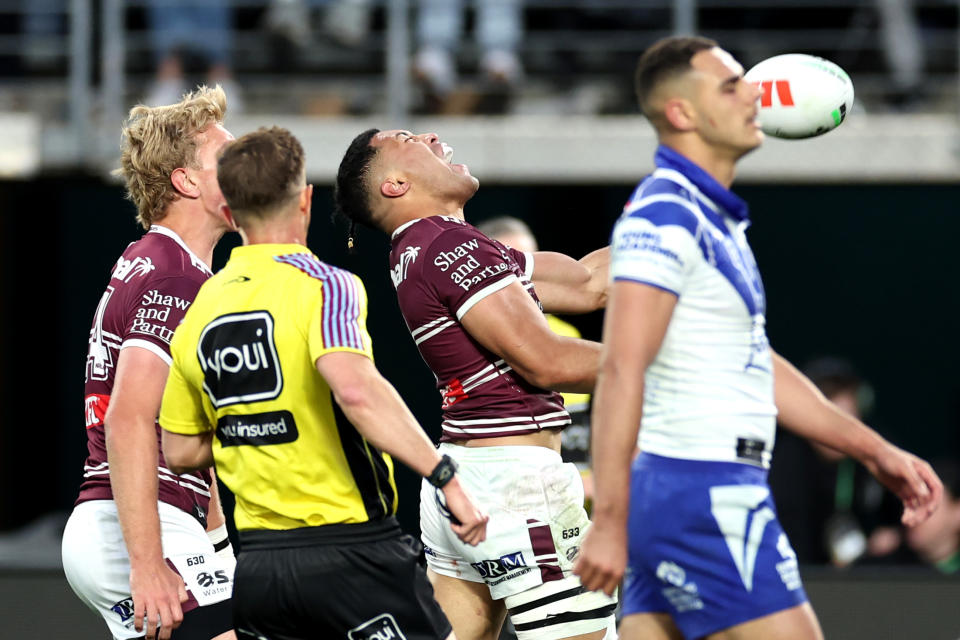 Tolutau Koula, pictured here after his winning try for Manly.