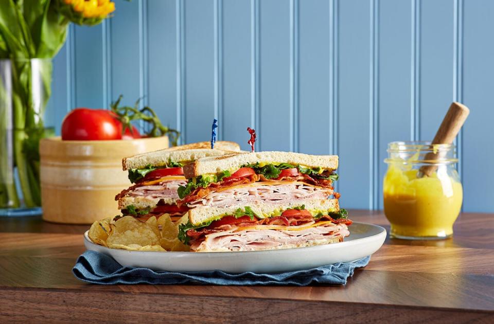 McAlister's Deli is widely known for its handcrafted sandwiches, including its King Club, pictured here. The sandwich features double the amount of smoked turkey, black forest ham, bacon, sharp cheddar and Swiss cheeses, spring mix lettuce, tomato, mayo and McAlister’s honey mustard, as compared to its traditional McAlister's Club sandwich.