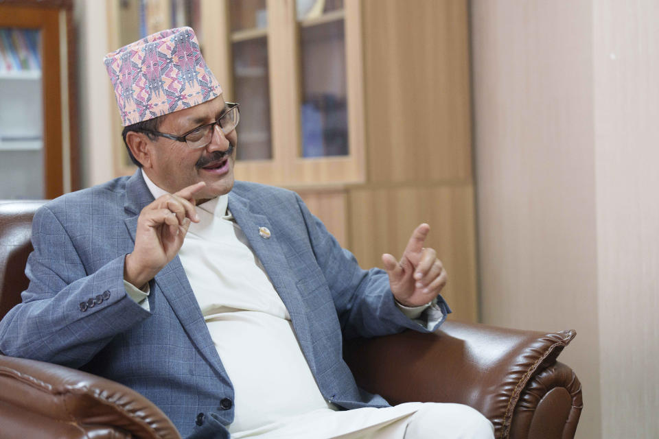 Nepal's Foreign Minister Narayan Prakash Saud talks to the Associated Press during an interview in Kathmandu, Nepal, Wednesday, April 26, 2023. Nepal's new government, led by a Communist prime minister, will be giving priority to enhancing relationship with both its giant neighbors India and China, but won't use them against each other for its own benefit, the newly appointed foreign minister said Wednesday. (AP Photo/Niranjan Shrestha)