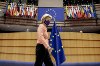 European Commission President Ursula von der Leyen arrives at the plenary ahead of her first State of the Union speech at the European Parliament in Brussels, Wednesday, Sept. 16, 2020. European Commission President Ursula von der Leyen will set out her vision of the future in her first State of the European Union address to the EU legislators. Weakened by the COVID-19 pandemic and the departure of the United Kingdom, she will center her speech on how the bloc should adapt to the challenges of the future, including global warming, the switch to a digital economy and immigration. (Olivier Hoslet, Pool via AP)