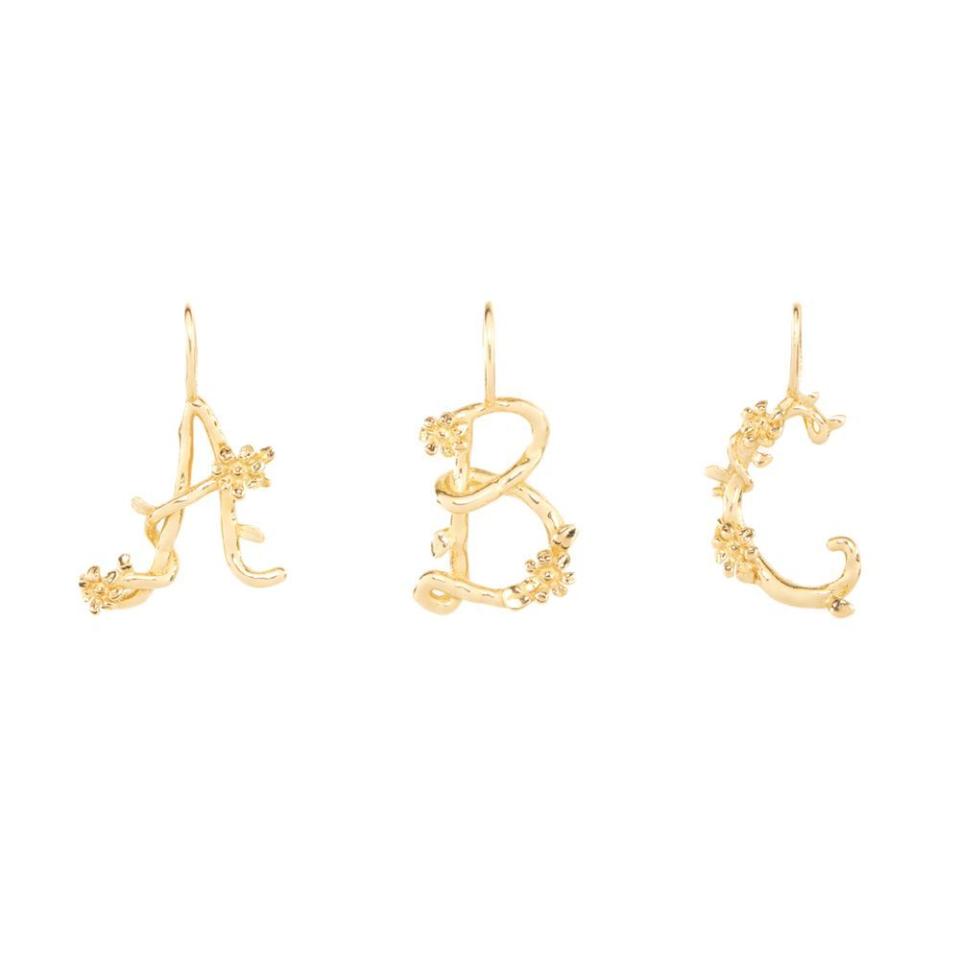 <p><a href="https://go.redirectingat.com?id=74968X1596630&url=https%3A%2F%2Fwww.catbirdnyc.com%2Fflower-garland-alphabet-charm-gold.html&sref=https%3A%2F%2F" rel="nofollow noopener" target="_blank" data-ylk="slk:Shop Now;elm:context_link;itc:0;sec:content-canvas" class="link ">Shop Now</a></p><p>Flower Garland Alphabet Charm </p><p>catbirdnyc.com</p><p>$98.00</p>