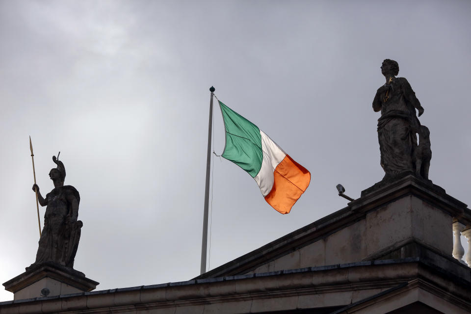 The Irish national flag flies above the Post Office building on O’Connell Street in Dublin, Ireland. Photo: Getty