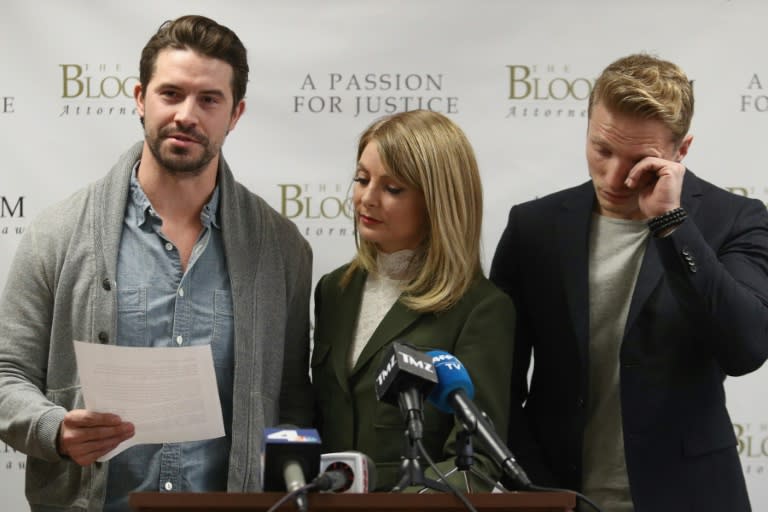 Model Mark Ricketson, left, speaks during a press conference with his attorney Lisa Bloom, center, and model Jason Boyce, who are accusing photographer Bruce Weber of sexual misconduct, in Woodland Hills, California on December 5, 2017