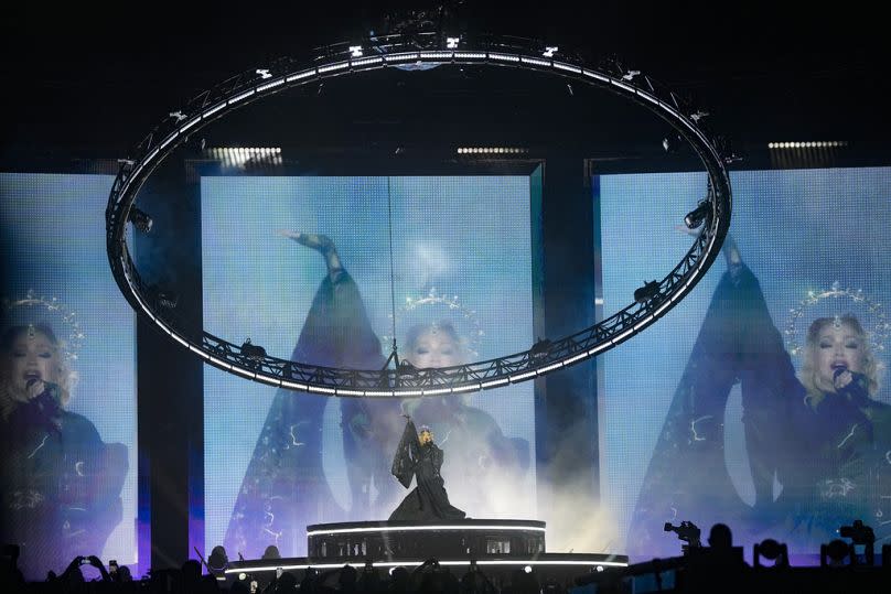 Madonna performs in the final show of her Celebration Tour, on Copacabana Beach in Rio de Janeiro.