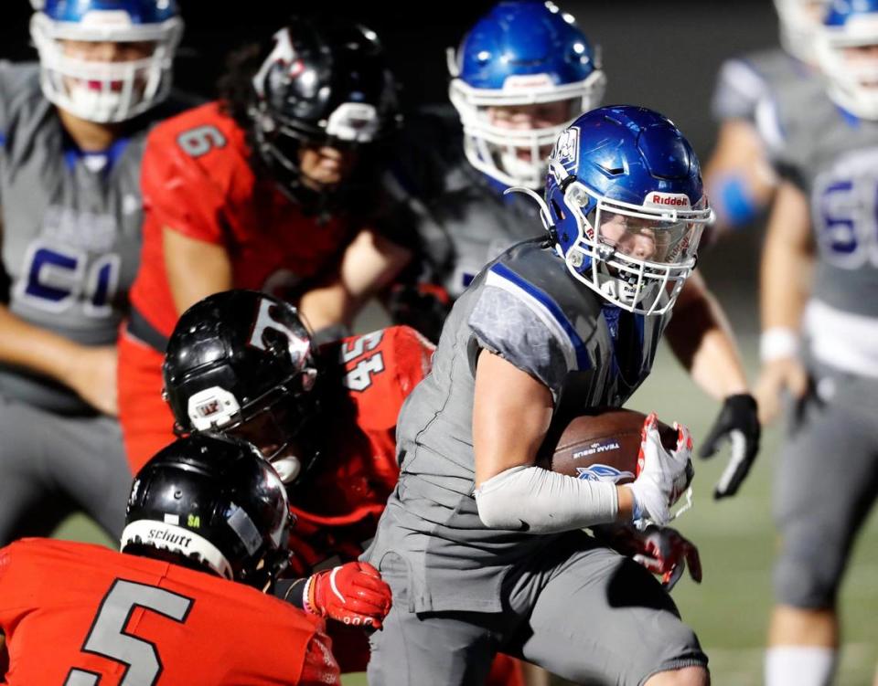 Weatherford running back Brayden Bork (3) breaks through the right side in a District 3-6A high school football game at Kangaroo Stadium in Weatherford, Texas, Friday Oct. 22, 2021. Trinity defeated Weatherford 49-21. (Special to the Star-Telegram Bob Booth)