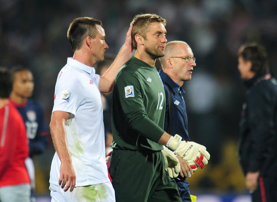 John Terry with goalkeeper Robert Green after England’s 1-1 draw with the USA at the 2010 World Cup in South Africa (Owen Humphreys/PA) (PA Archive)