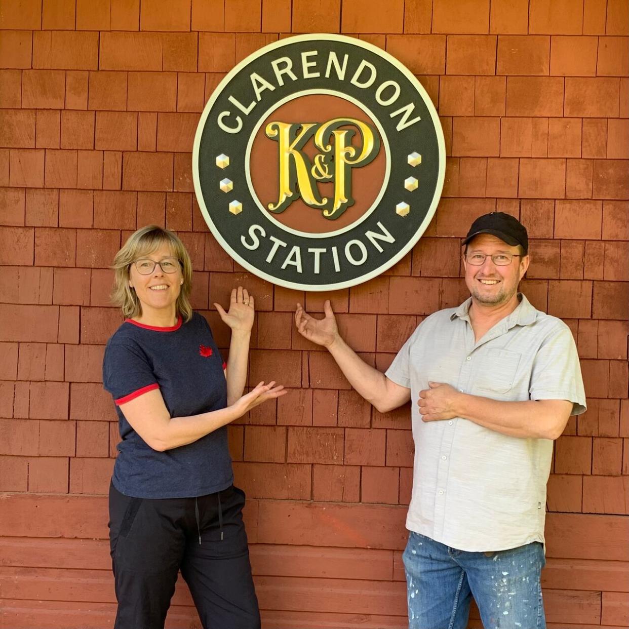 Husband-and-wife team Noel and Kathy Bateman of Parham, Ont., were recently recognized for their work restoring and renovating the historic Clarendon train station, north of Sharbot Lake, as a vacation rental.  (Submitted by Kathy Bateman - image credit)