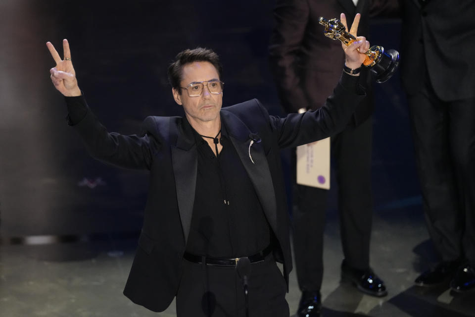 Robert Downey Junior accepts the Oscar for Best Supporting Acton actor at the Dolby Theatre in Los Angeles on Sunday.