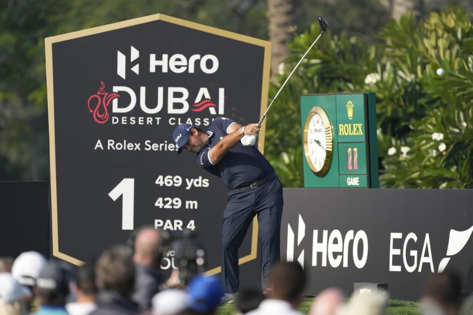 Patrick Reed of the U.S. tees off on the first hole during the final round of the Dubai Desert Classic, in Dubai, United Arab Emirates, Monday, Jan. 30, 2023. (AP Photo/Kamran Jebreili)