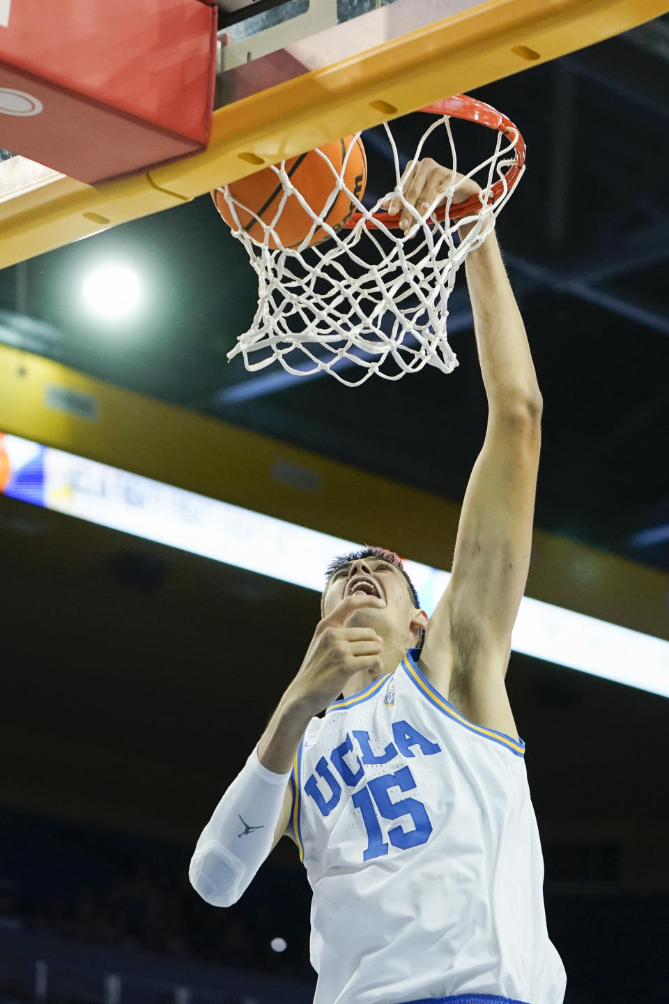 UCLA center Aday Mara dunks the ball during the first half of an NCAA college basketball game against St. Francis, Monday, Nov. 6, 2023, in Los Angeles. (AP Photo/Ryan Sun)