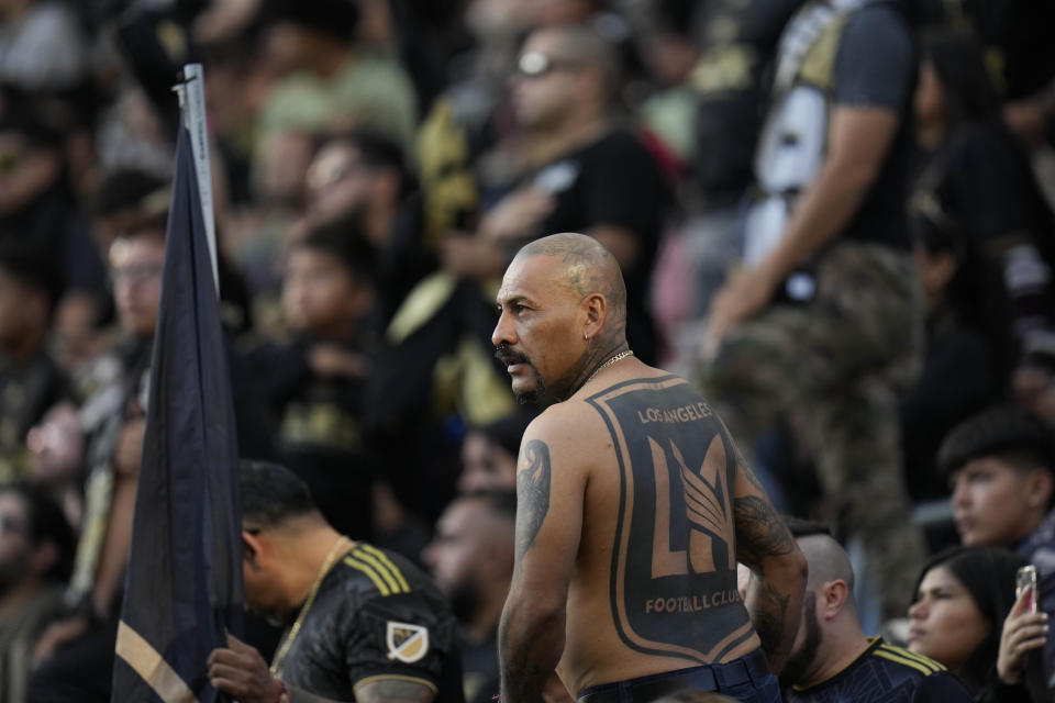 Fans listen to the national anthem before an MLS soccer match between Los Angeles FC and Real Salt Lake, Sunday, Oct. 1, 2023, in Los Angeles. (AP Photo/Jae C. Hong)