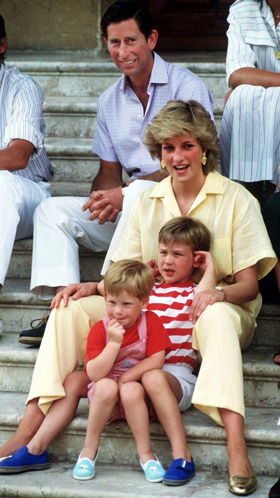 The Prince and Princess of Wales on holiday with their children, Princes William and Harry, at the Spanish royal residence Marivent Palace, August 1987. (Photo by Terry Fincher/Getty Images)