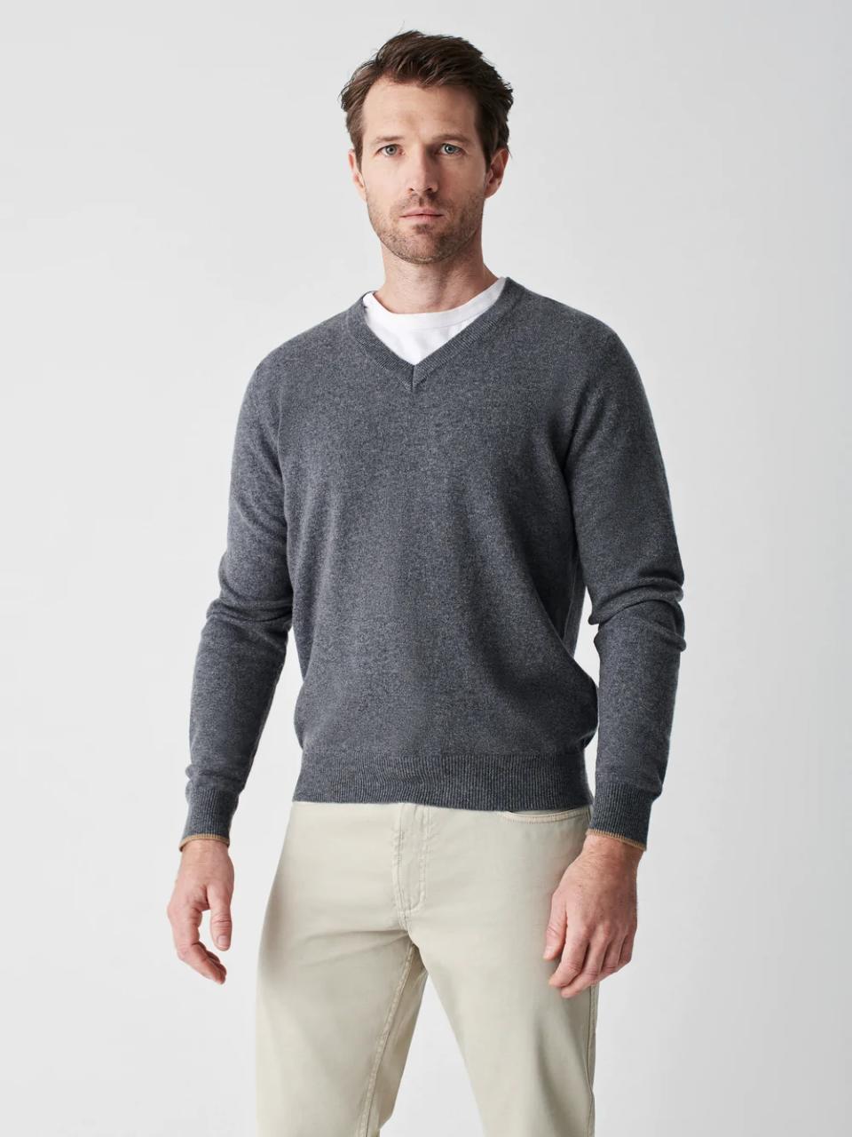 Model wearing one of the best V-neck men's sweaters from Faherty.