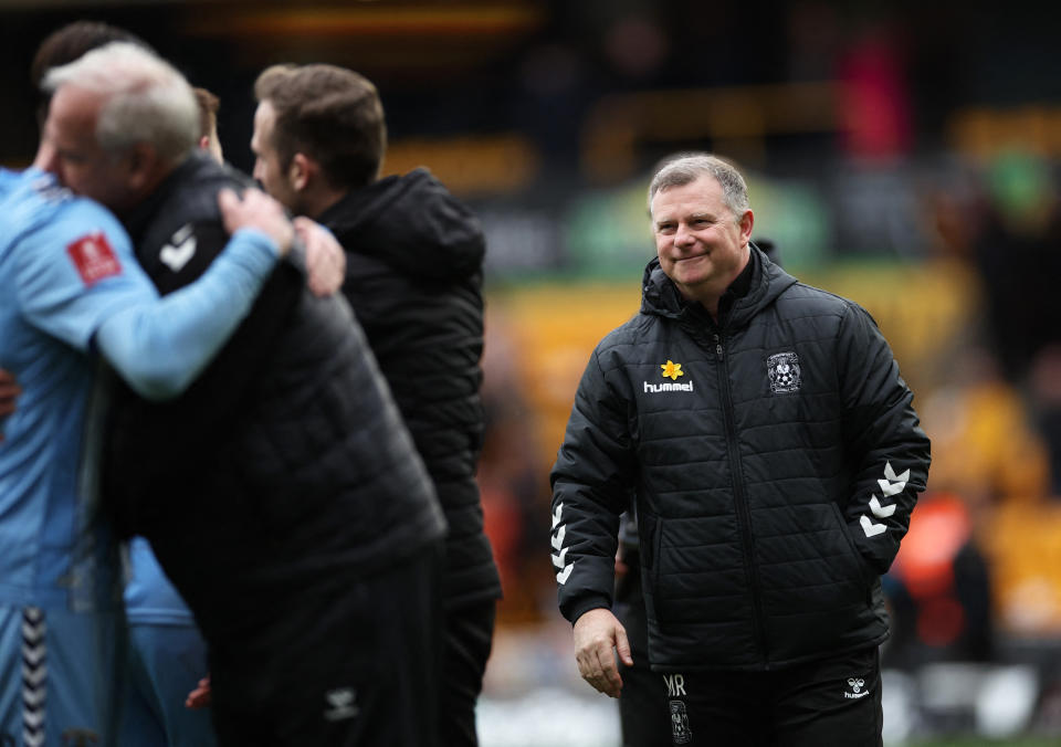 Coventry City manger Mark Robins celebrates after stunning Wolves in the FA Cup quarter-final. His club will face his old club Manchester United in the semi-finals. 