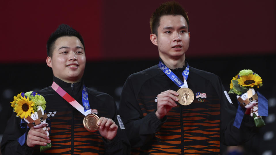 Bronze medallists Malaysia’s Aaron Chia and Soh Wooi Yik pose with their bronze medals after the Tokyo 2020 Olympics badminton Men’s Doubles medal ceremony at Musashino Forest Sport Plaza, Tokyo July 31, 2021. — Reuters pic