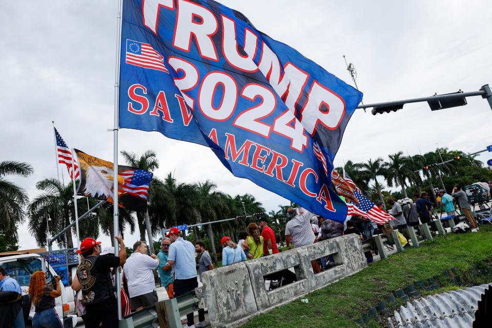 Supporters of former U.S. President Donald Trump protest outside of Trump National Doral resort as they await his arrival  on June 12, 2023 in Doral, Florida. Trump is scheduled to appear in federal court for his arraignment on charges including possession of national security documents after leaving office, obstruction, and making false statements.