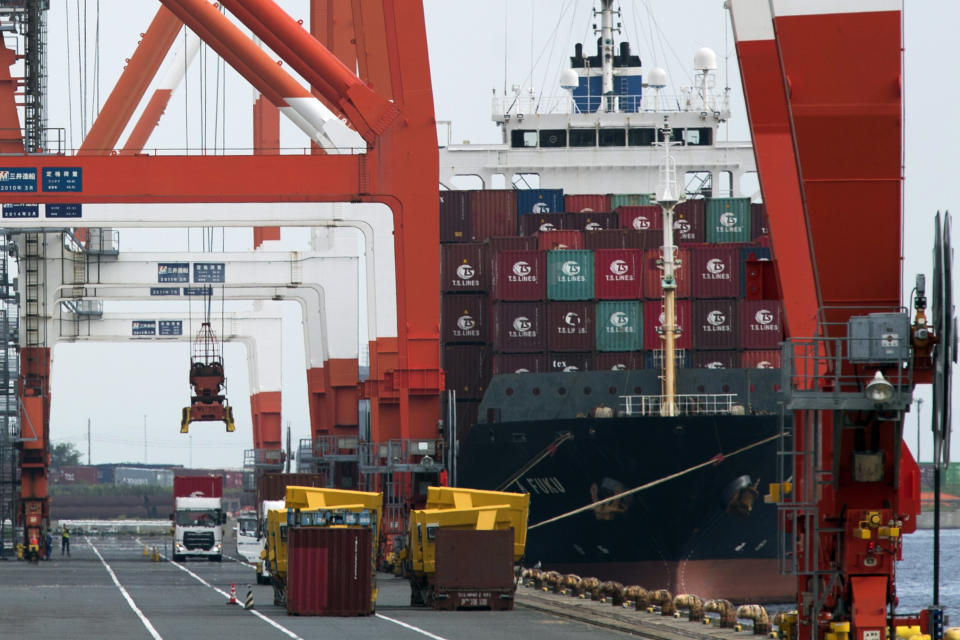 FILE - A crane prepares to unload a container from a semi-trailer truck at the Aomi wharf in Tokyo on Sept. 17, 2021. The Office of the U.S. Trade Representative on Friday, Sept. 23, 2022, released its negotiating objectives for the Indo-Pacific Economic Framework, a deal with the 12 nations launched in May. Among them, the U.S. wants the Indo-Pacific countries to improve their labor and environmental standards and ensure their markets remain open to competition, while also taking steps to ease supply-chain backlogs at border crossings. (AP Photo/Hiro Komae, File)
