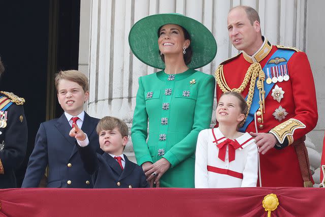 <p>Neil Mockford/Getty</p> Prince George, Prince Louis, Kate Middleton, Princess Charlotte and Prince William at Trooping the Colour 2023