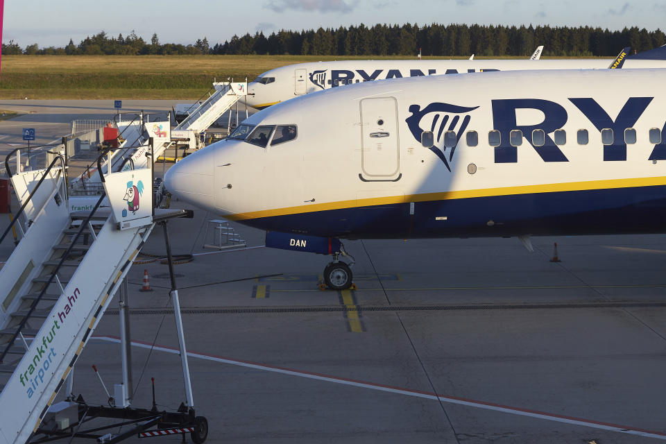 Aircraft of Irish Ryanair airline stand on the tarmac of the Hahn airport, western Germany, Friday, Aug. 10, 2018 when several flights were cancelled due to a strike of pilots. (Thomas Frey/dpa via AP)