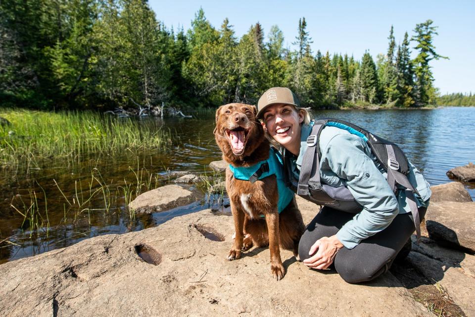 Caitlin Looby, the new Great Lakes reporter at the Milwaukee Journal Sentinel, and her dog Odessa in the Boundary Water Canoe Area Wilderness in northern Minn.